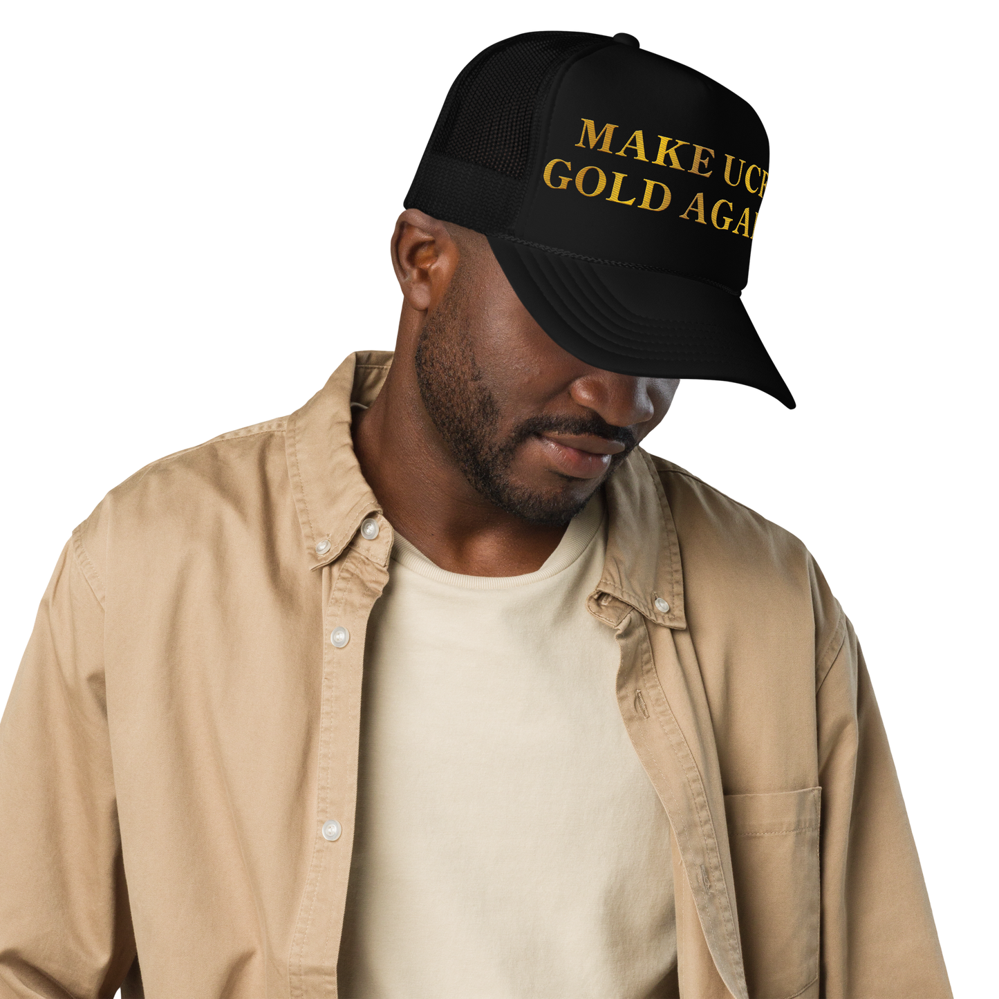 Make UCF Gold Again black trucker hat worn by a male model.