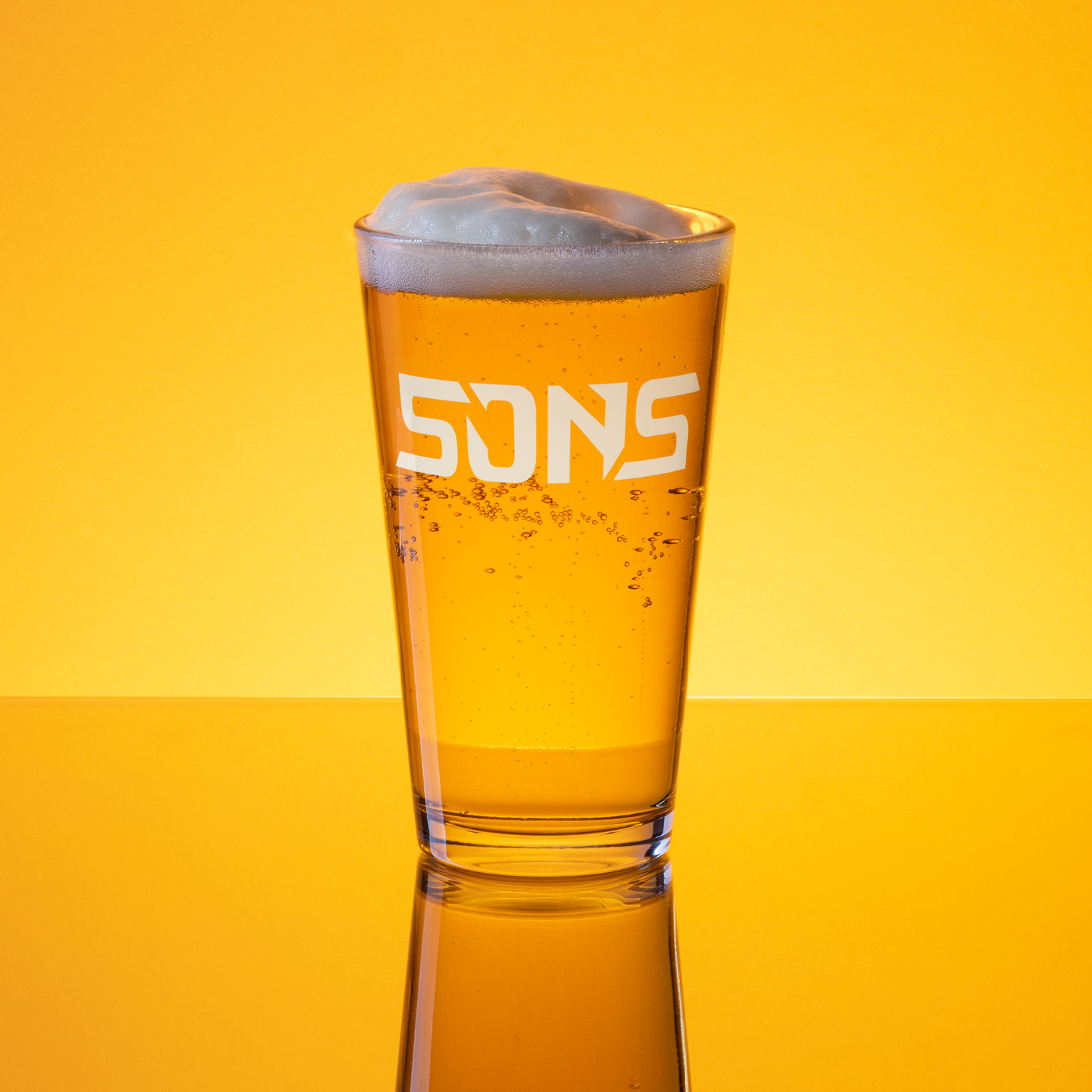 Sons of UCF Beer Mug filled with beer featuring Sons logo.